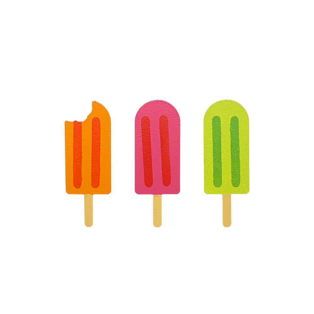 Three different popsicle magnets on a transparent background. One has a bite out of it. 